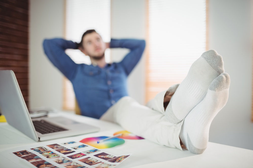 Man taking a break at desk